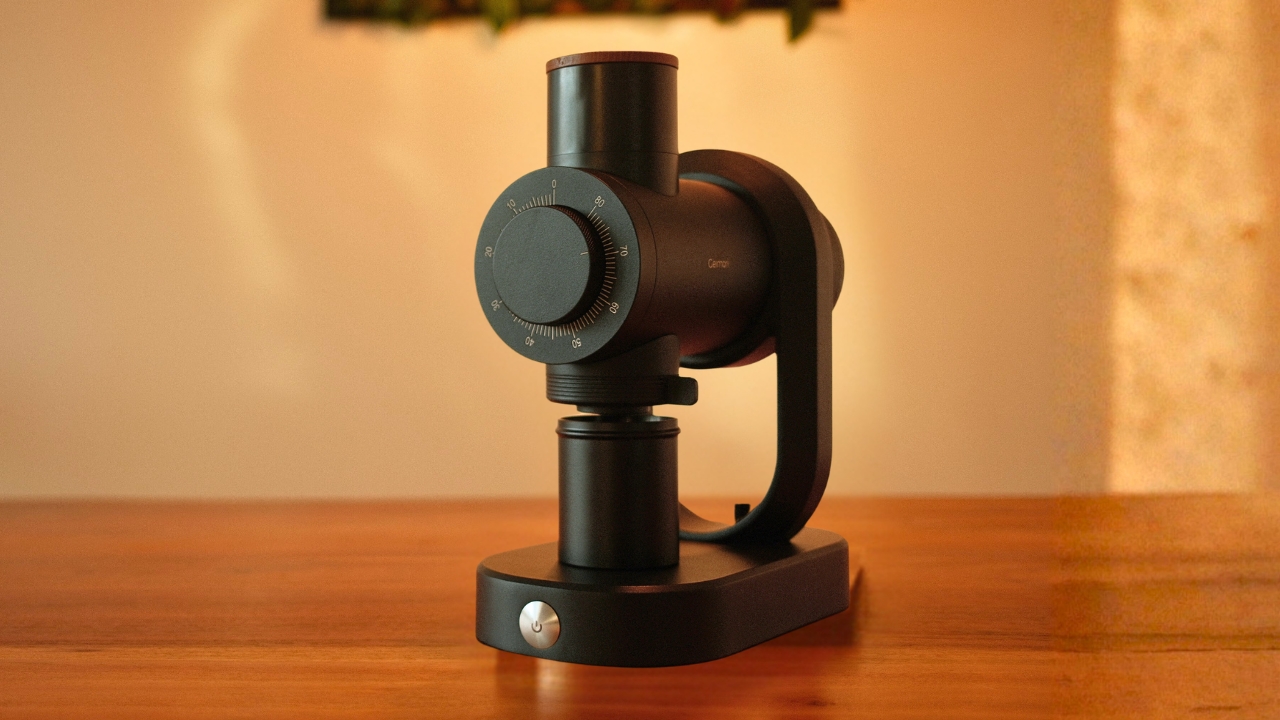 Geimori GU64 single dose coffee grinder on wooden table